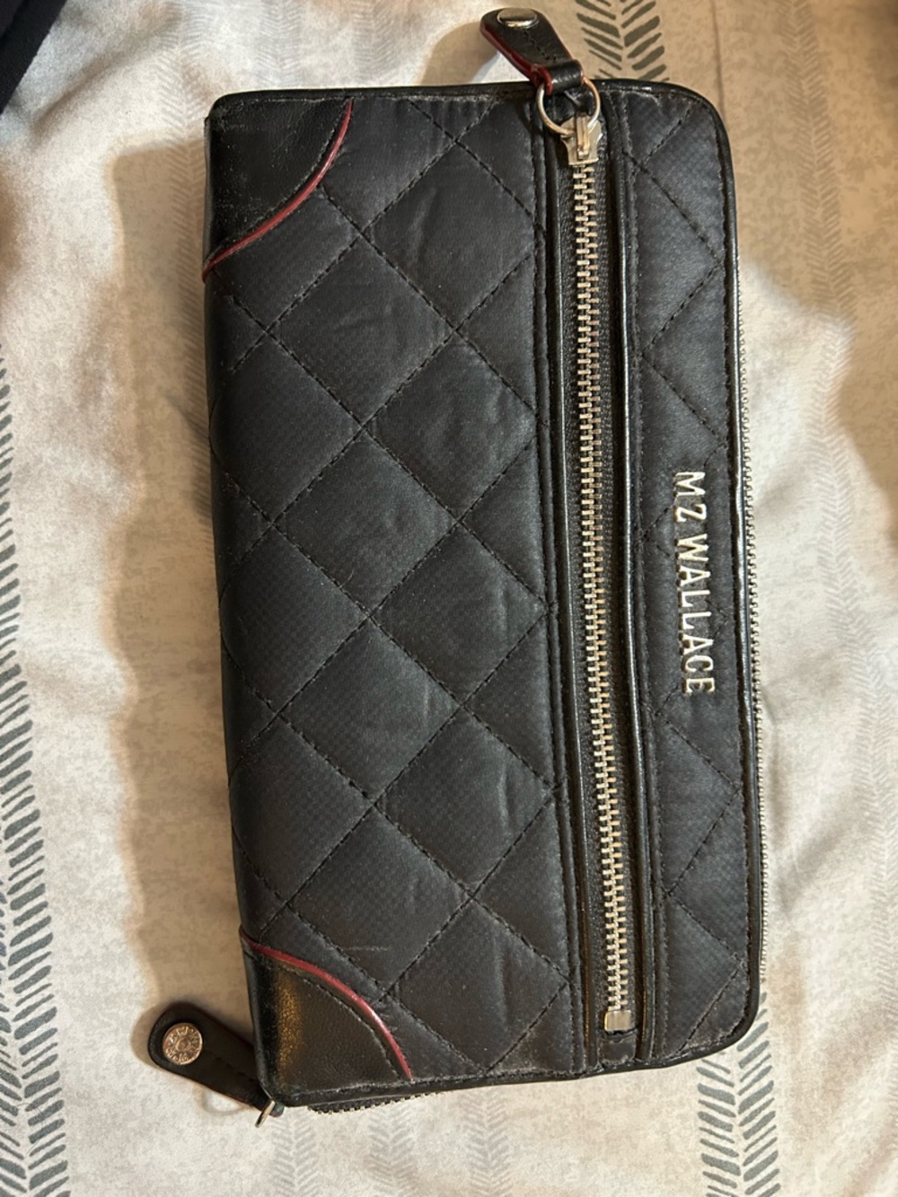 MZ Wallace Black Quilted Zip-Around Wallet with Red Trim